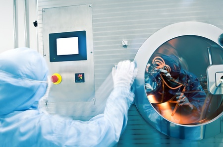 Technicians working in the pharmaceutical production line