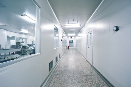 Technicians working in the pharmaceutical production lineのeditorial素材