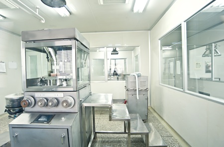 Technicians working in the pharmaceutical production lineのeditorial素材