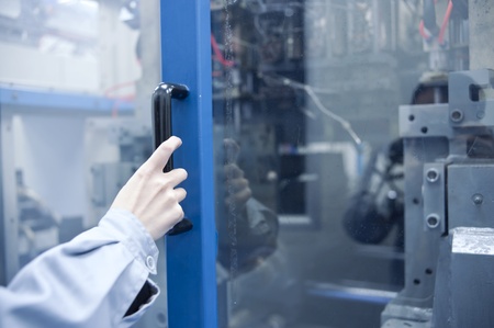 Staff in the operation of medical equipmentのeditorial素材