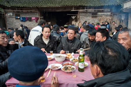 Sichuan, China -22 January, 2012, unknown women and men at home, a party to celebrate the Spring Festival, Sichuan, China, 2012 January 22,のeditorial素材