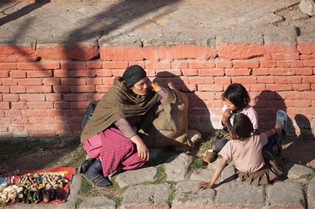 Kathmandu, Nepal  February 4, 2012, Buddhism prayer resting by side of the road in Nepal.
