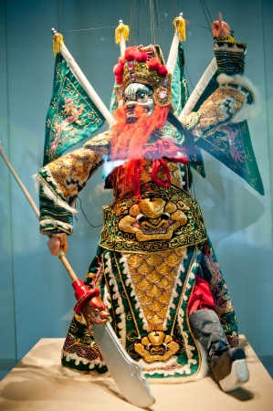 Human sculptures in the puppet theater, Made in Chinaの写真素材