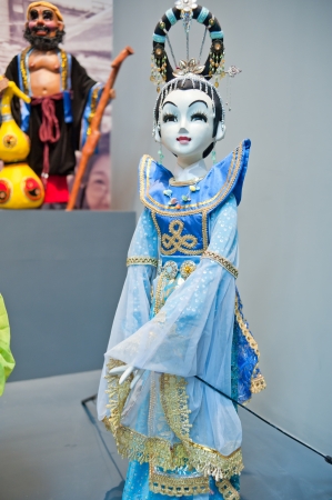 Human sculptures in the puppet theater, Made in Chinaの写真素材