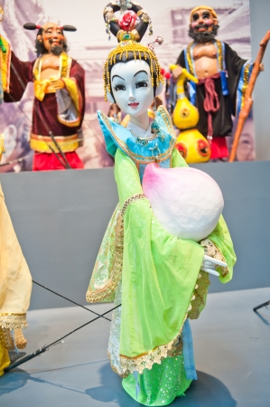 Human sculptures in the puppet theater, Made in Chinaの写真素材