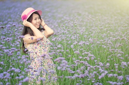 A Chinese young women playing in the vast lavenderの写真素材