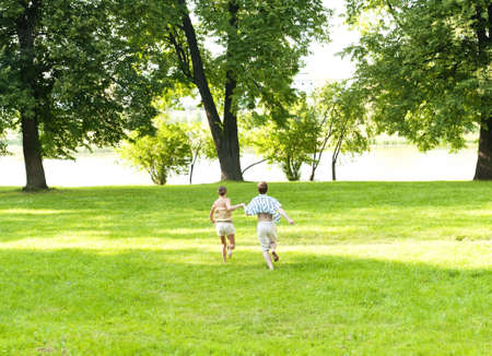 this photo shows a young couple that runsの写真素材