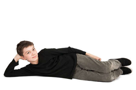 Portrait of a smiling boy isolated on white backgroundの写真素材