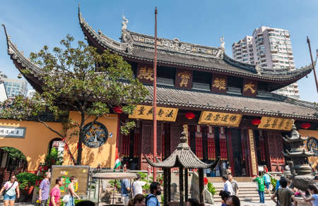 Chinese tourists visit the ancient monastery.