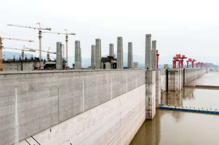 View of the Three Gorges Dam on the Yangtze River in China in misty ambiance