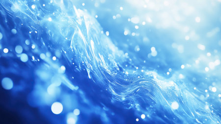 This captivating image showcases flowing blue water waves illuminated by soft light reflections and bokeh effects, evoking a sense of tranquility and beauty.の素材