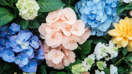 A stunning close-up of hydrangeas and various flowers in soft pastel hues, showcasing their delicate petals and lush greenery. The arrangement evokes serenity and natural beauty.の素材