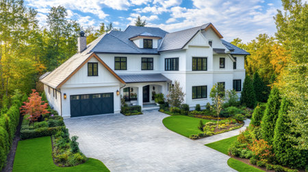 A stunning modern home with a pristine exterior, beautifully landscaped yard, and lush greenery, perfect for showcasing upscale residential design and tranquility.の素材