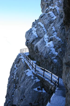 Railing along the edge of Mount Pilatus in the Siwss Alps.の写真素材
