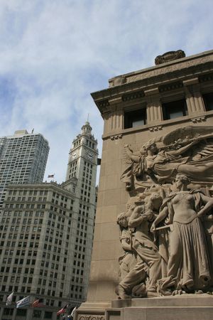 Ornate carvings along the Michigan Avenue Bridge, Chicago.  Wrigley Building in the background.の写真素材
