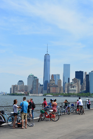 New York City, USA - May 26, 2014 - People gathered on Governors Island with the Lower Manhattan skyline in the background のeditorial素材