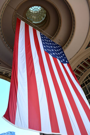 Giant flag haging in downtown Boston to celebrate the Fourth of July の写真素材