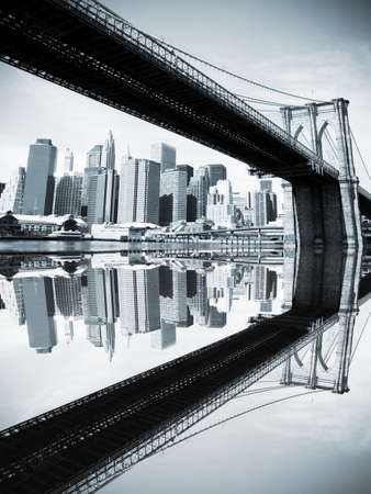 Brooklyn Bridge and Lower Manhattan skyline along the East River.の写真素材
