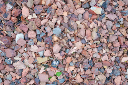 Abstract various pebble rock stones texture background with round pebbleの写真素材