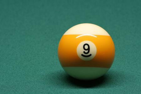 Pool ball number 09 in pool tableの写真素材