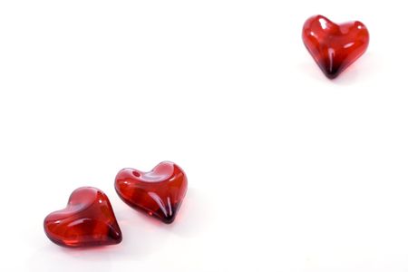 Small gummy hearts isolated over white background. Shallow depth of field.の写真素材