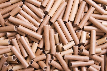 Pattern formed by a pile of cardboard rolls to recycleの写真素材