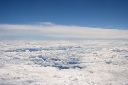 Cloudy sky seen from above. Shot from a airplane.