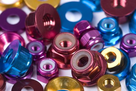 Macro shot of assorted aluminium nuts and washersの写真素材