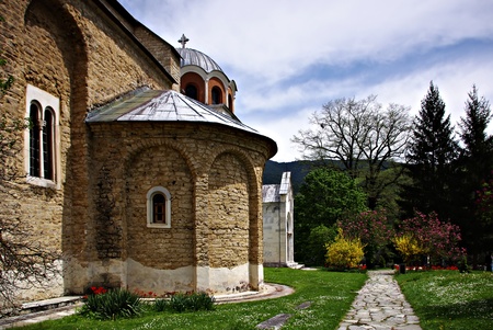 The most famous Serbian monastery with beautifull park and flowers at sunny summer day with clear blue sky の写真素材