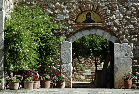 Entrance to the church at old Greek monastery of Agios Loukas at sunny summer day 