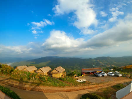 Beautiful view at valley in an early morning Doi Mon Jam Thailand,green field mountain and blue skyの写真素材