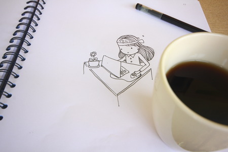 Open a blank white notebook, pen and cup of coffee on the deskのeditorial素材