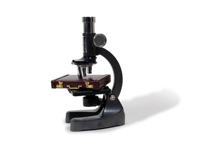 Small Microscope used in scientific research, with Burgandy leather Briefcase used to carry items to...
