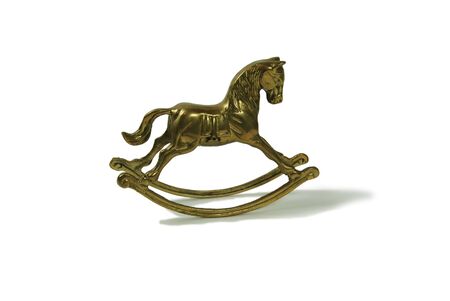 Brass rocking horse represent childhoodの写真素材