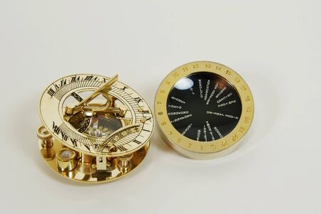 Sundial telling the number of hours to go or the years left, Antique time zone converter used by...