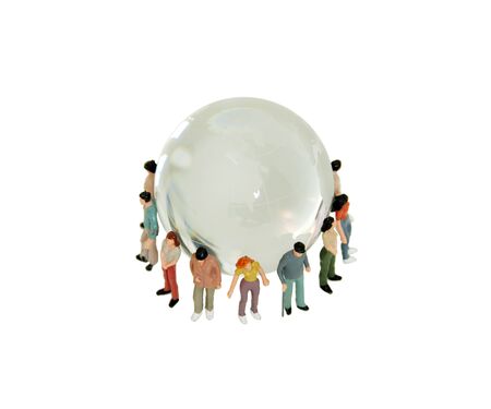 A variety of people grouped together to represent diversity around a crystal globe with navigational linesの写真素材