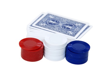 Playing cards used in a variety of competitive games against other players for entertainment and a set of chips for money markers-Path orig sizeのeditorial素材