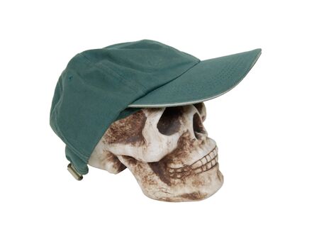 Dark heavy baseball cap with wide brim on a skullの写真素材