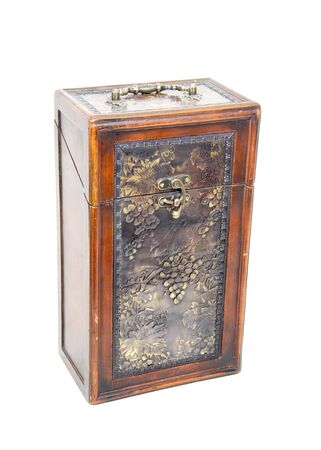 An old case with a pressed metal grape and vines motif for storing items-Path includedの写真素材