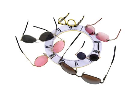 Time for a different view shown by various styles of glasses around a clock face 