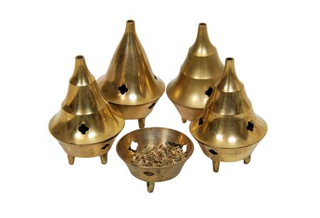 Intricate brass burners for burning aromatic incense and containing the ashes for disposal - includedの写真素材