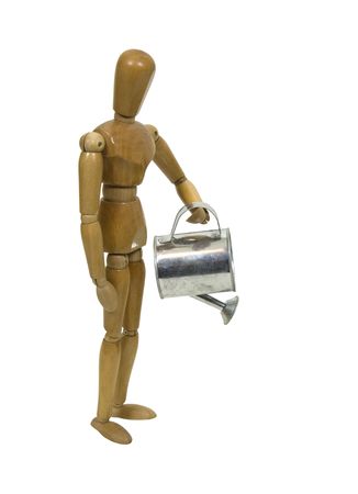 Model holding a small metal watering can for bringing life to the plants - includedの写真素材