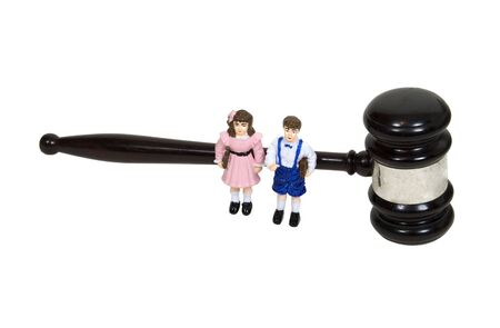 Family law shown by school kids with a wooden gavel - path includedの写真素材