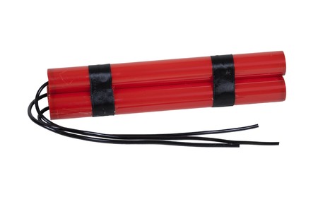 Bundle of red sticks of dynamite with long fusesの写真素材