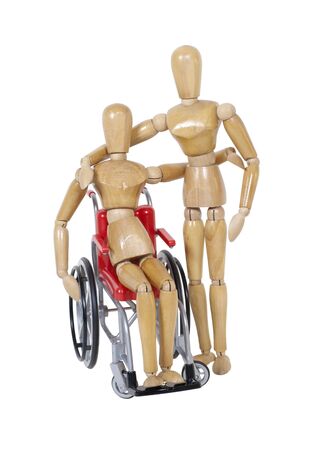 A couple of friends with their arms around each other with one in a wheelchairの写真素材