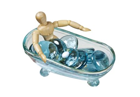 Relaxing in blue water in an antique crystal claw footed bathtub - path includedの写真素材