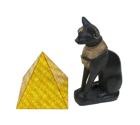 Egyptian cat with gold embellishments next to a sun pyramid の写真素材