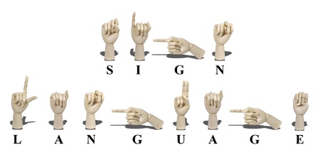 Sign Language spelled out in American Sign language is expressed with visible hand gestures for communication of the deafの写真素材