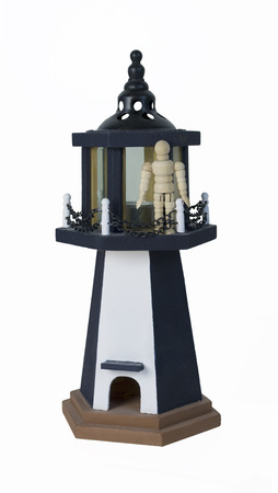 Standing on the parapet of a lighthouse - path includedの写真素材