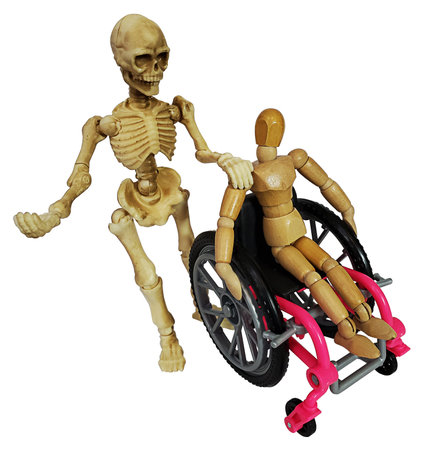 Person in Wheelchair with Skeleton Pointing offering a direction to goの写真素材